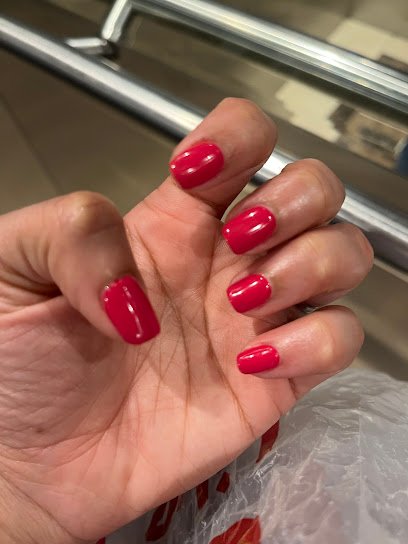 Glossy red manicure